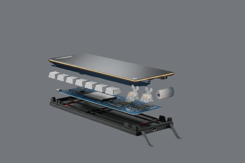 Side view of Cherry KW X ULP internals: sealed battery, aluminum top, plastic base.